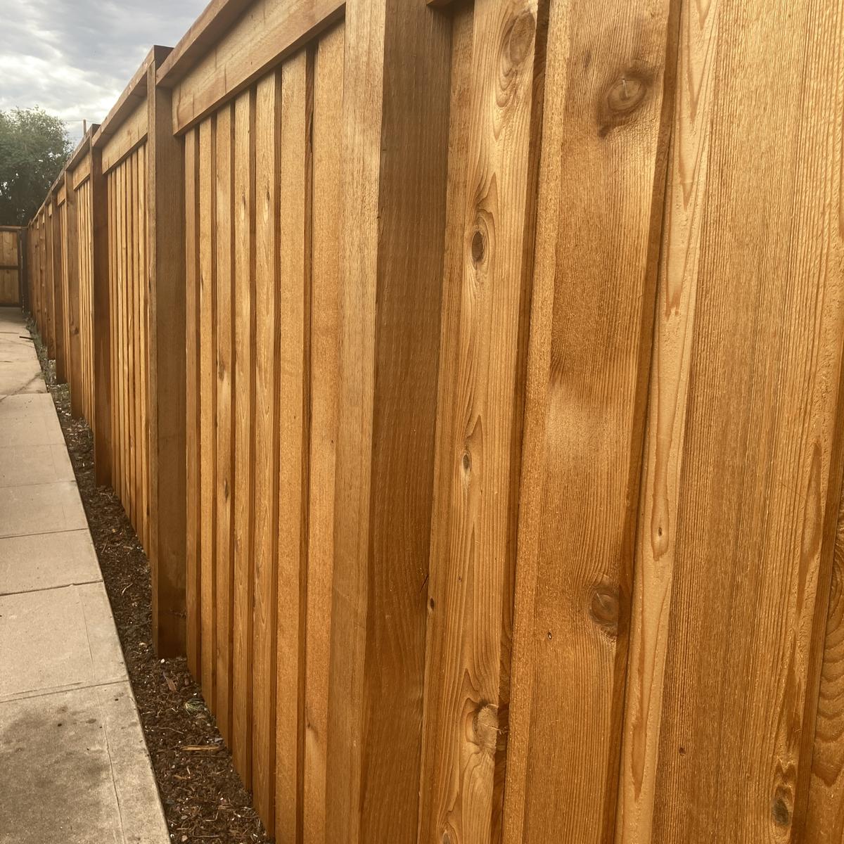 A wide shot of the finished fence, facing west